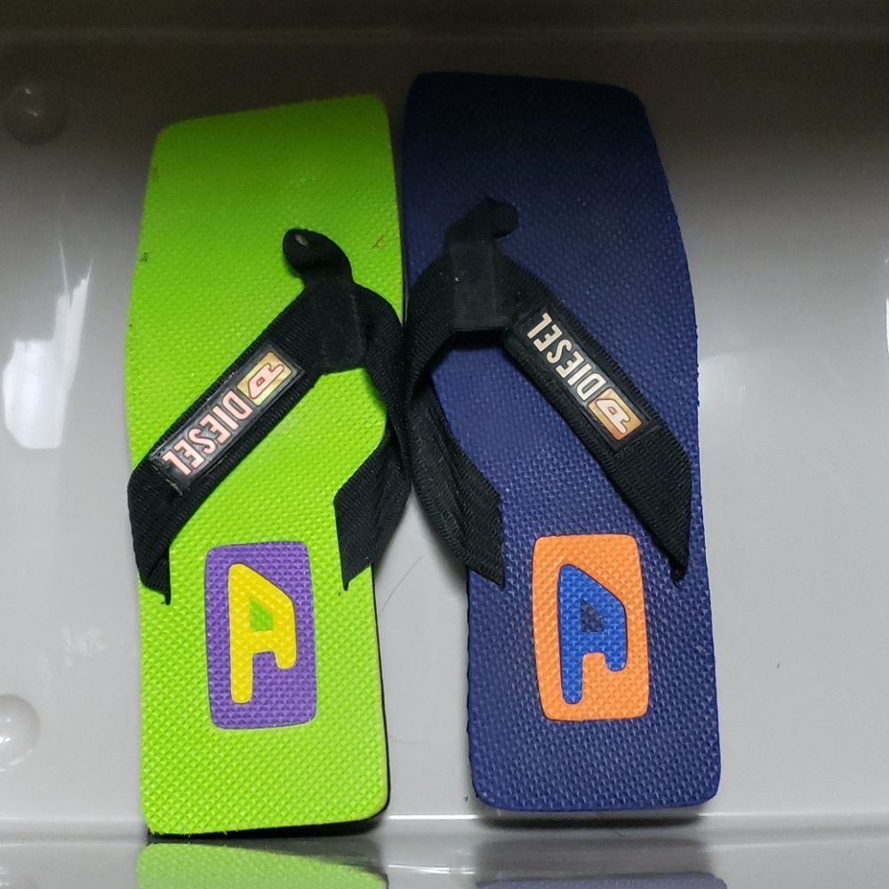 Pair of mismatch slipper...